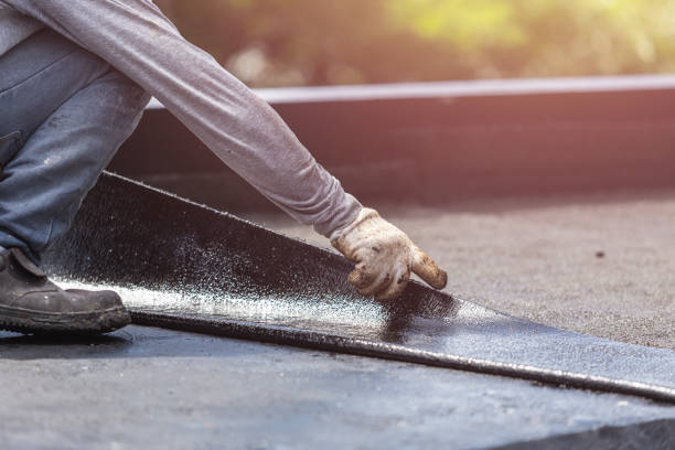 Professional Waterproofing technician working in Newton, KS